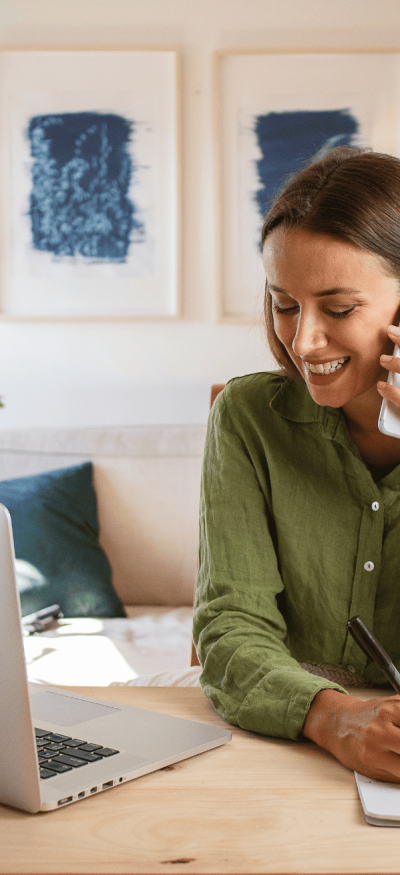 Women on phone making appointment